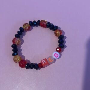 Rise of red bracelet